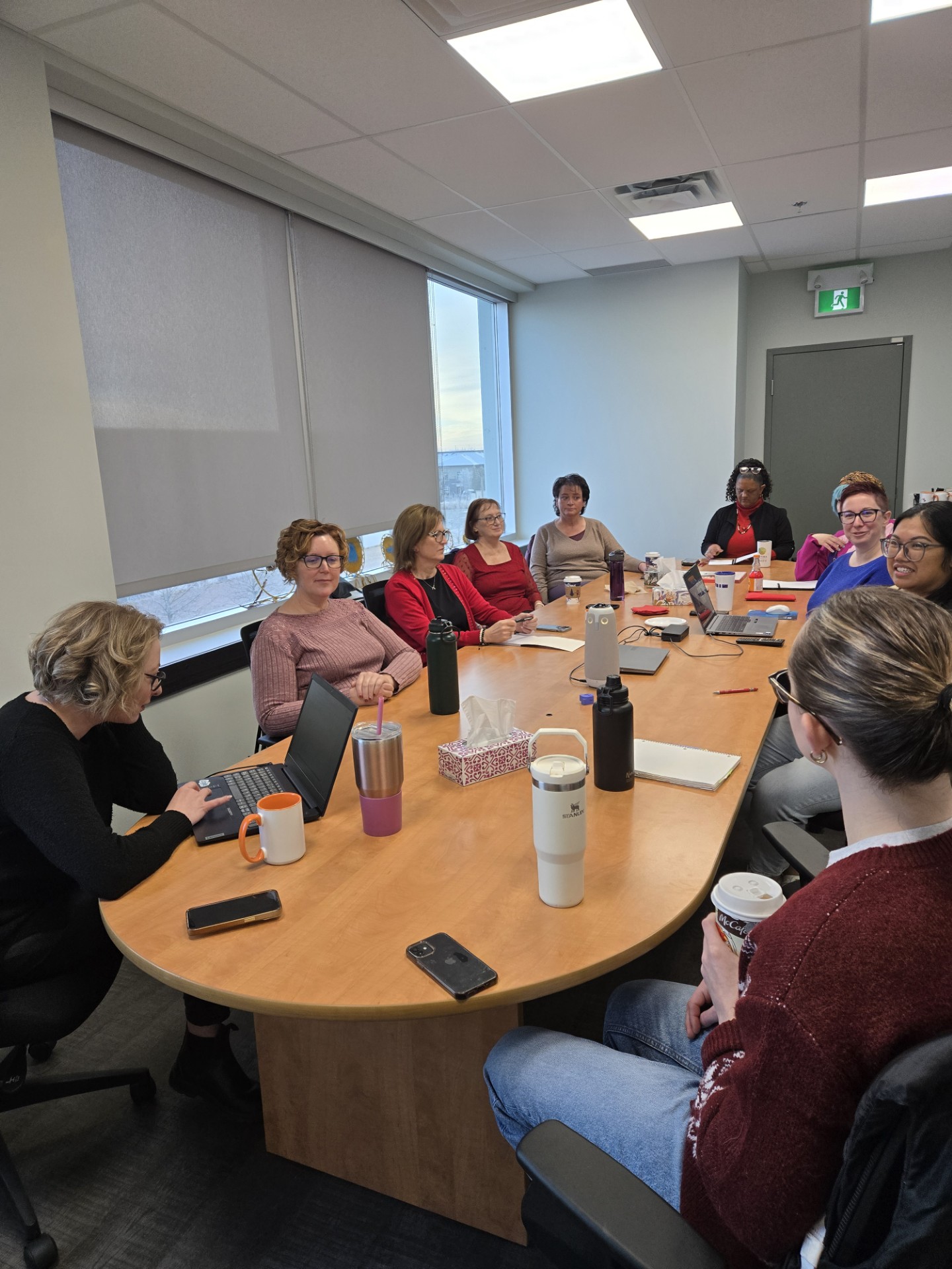Staff at the Canadian Accreditation Council are having a meeting